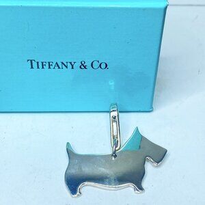 Authentic Tiffany & Co sterling silver dog charm, stamped “Tiffany & Co 925” as